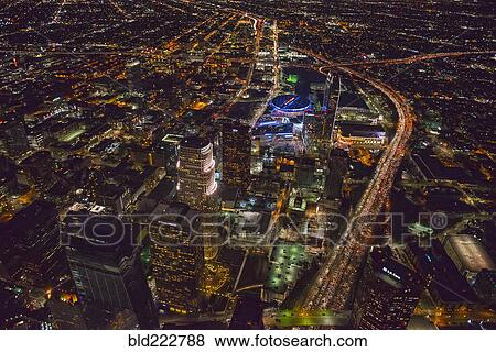 Stock Photo - "Aerial view of Los Angeles cityscape lit up at night, California, United States". Fotosearch