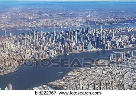 Stock Photo - "Aerial view of river and city, New York, New York, United States, ". Fotosearch