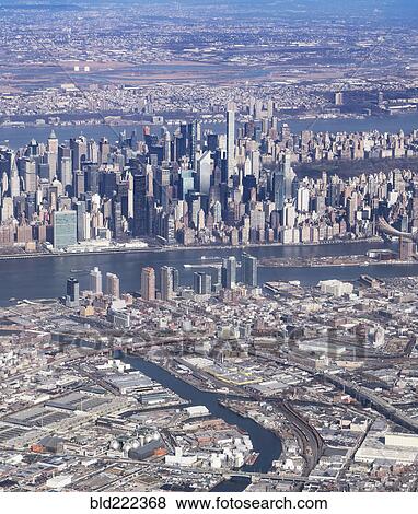 "Aerial view of river and city, New York, New York, United States, " View Large Photo Image Stock Photo - "Aerial view of river and city, New York, New York, United States, ". Fotosearch