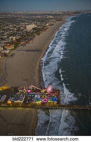 Stock Image - "Aerial view of Santa Monica Pier in Los Angeles cityscape, California, United States". Fotosearch