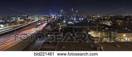 Stock Image - Aerial view of traffic on highway in Los Angeles cityscape, California, United States. Fotosearch