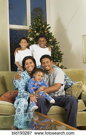 African American family in pajamas at Christmas time View Large Photo Image Stock Photo - African American family in pajamas at Christmas time. Fotosearch