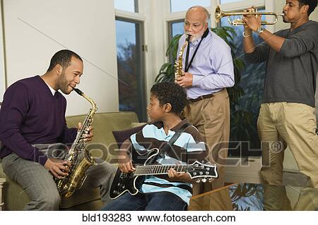 African American family playing musical instruments together View Large Photo Image Stock Image - African American family playing musical instruments together. Fotosearch