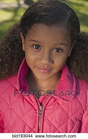 Picture - African American girl smiling. Fotosearch
