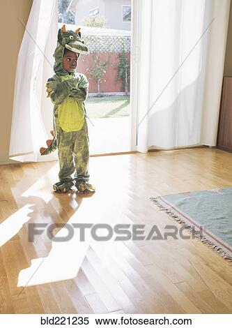 African American girl wearing dragon costume View Large Photo Image Stock Photography - African American girl wearing dragon costume. Fotosearch