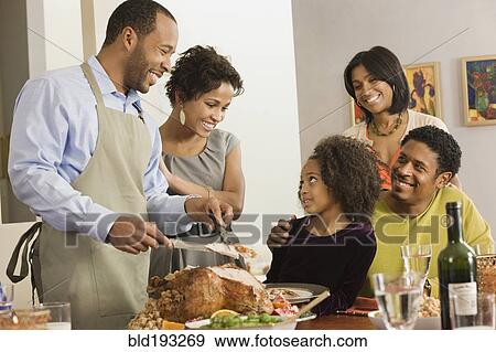 African American man carving Thanksgiving turkey View Large Photo Image Stock Photo - African American man carving Thanksgiving turkey. Fotosearch
