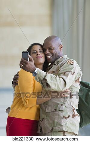 African American soldier and wife taking selfie View Large Photo Image Stock Image - African American soldier and wife taking selfie. Fotosearch