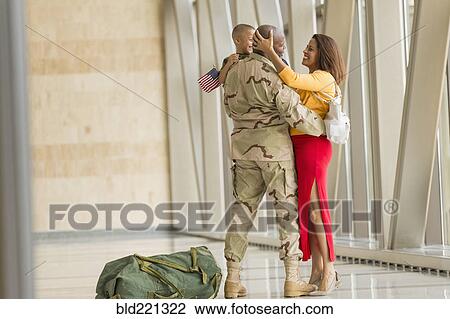 African American soldier greeting family in airport View Large Photo Image Stock Image - African American soldier greeting family in airport. Fotosearch
