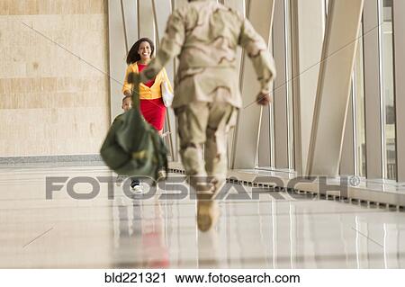 African American soldier greeting wife in airport View Large Photo Image Stock Image - African American soldier greeting wife in airport. Fotosearch