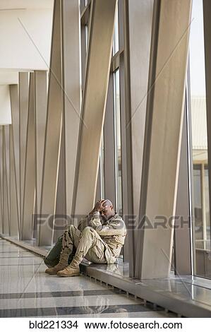 African American soldier sitting in airport View Large Photo Image Picture - African American soldier sitting in airport. Fotosearch