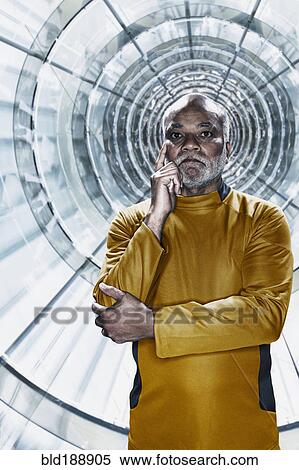 Stock Photography - African businessman in futuristic setting. Fotosearch