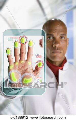 Stock Image - African businessman touching hi-tech door access lock. Fotosearch