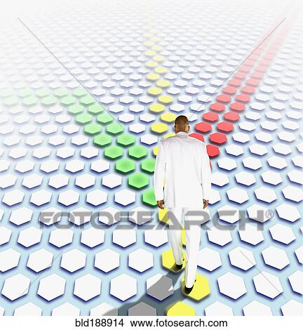 African businessman walking along colored path of hexagons View Large Photo Image Picture - African businessman walking along colored path of hexagons. Fotosearch