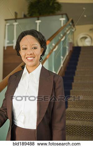 African businesswoman on staircase View Large Photo Image Stock Photo - African businesswoman on staircase. Fotosearch