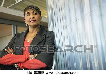 African businesswoman with arms crossed View Large Photo Image Stock Photo - African businesswoman with arms crossed. Fotosearch
