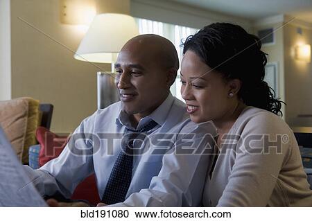 African couple reading newspaper View Large Photo Image Stock Image - African couple reading newspaper. Fotosearch