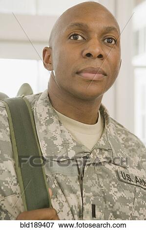 Stock Photo - African man in military uniform. Fotosearch