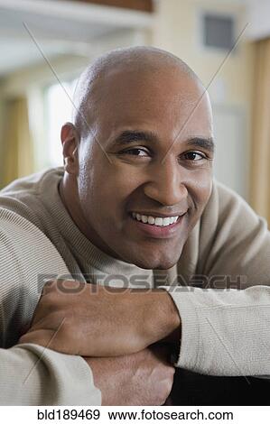 Stock Photo - African man smiling. Fotosearch