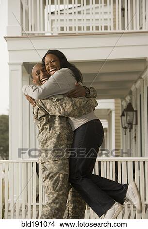 African soldier hugging girlfriend View Large Photo Image Picture - African soldier hugging girlfriend. Fotosearch