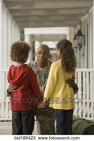 African soldier talking to son and daughter View Large Photo Image Stock Image - African soldier talking to son and daughter. Fotosearch