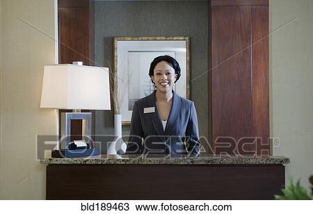 African woman at concierge desk View Large Photo Image Stock Image - African woman at concierge desk. Fotosearch
