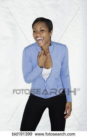 Stock Photo - African woman laughing. Fotosearch