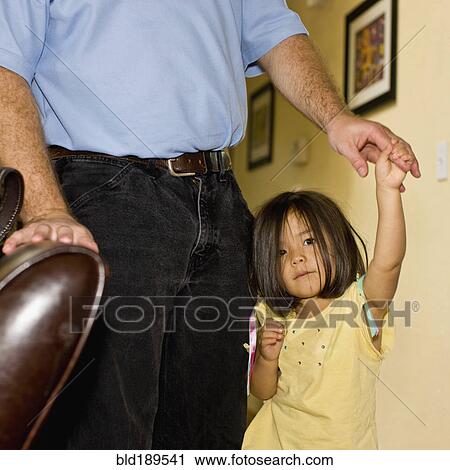 Asian girl holding father's hand View Large Photo Image Stock Image - Asian girl holding father's hand. Fotosearch
