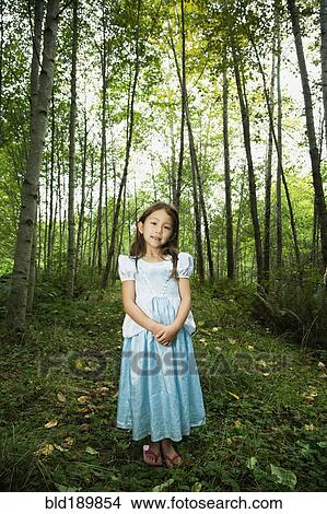 Asian girl wearing costume in woods View Large Photo Image Picture - Asian girl wearing costume in woods. Fotosearch
