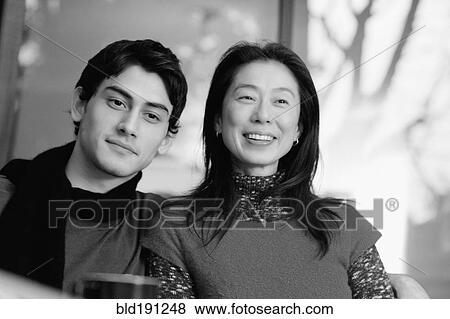Stock Photo - Asian mother smiling with son. Fotosearch