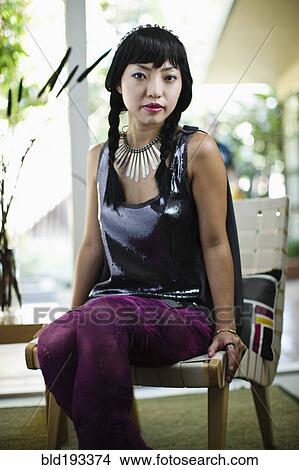 Picture - Asian woman in glamorous outfit. Fotosearch