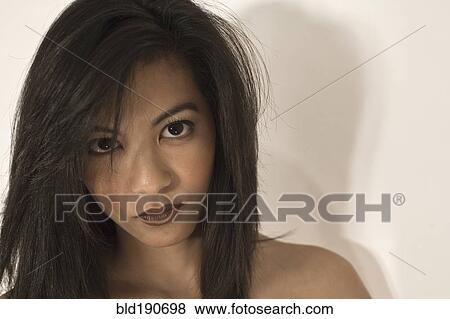 Stock Photo - Asian woman with bare shoulders. Fotosearch