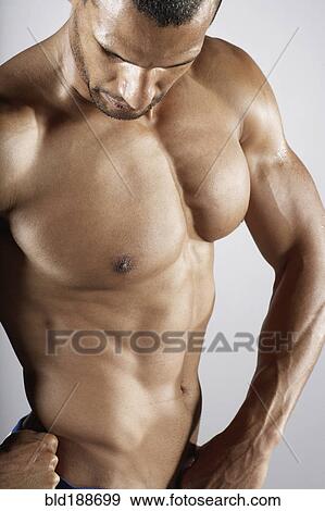 Bare chested mixed race man View Large Photo Image Stock Photo - Bare chested mixed race man. Fotosearch