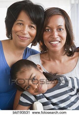 Black grandmother smiling with daughter and granddaughter View Large Photo Image Stock Image - Black grandmother smiling with daughter and granddaughter. Fotosearch