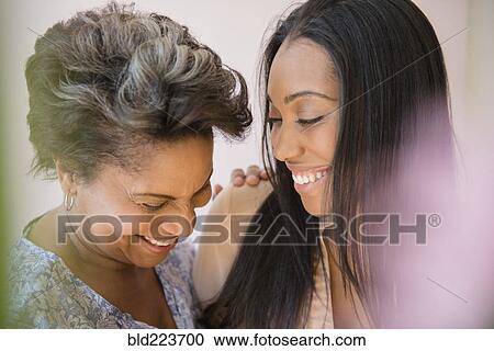 Black women laughing View Large Photo Image Stock Image - Black women laughing. Fotosearch