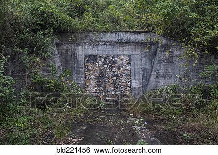 Stock Photograph - Bricked up bunker in abandoned military base. Fotosearch