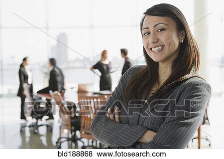 Stock Photo - Business people in conference room for meeting. Fotosearch