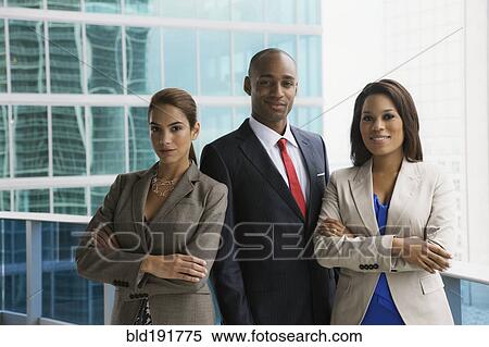 Stock Photography - Business people on urban balcony. Fotosearch