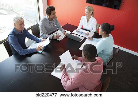 Business people talking in conference room meeting View Large Photo Image Stock Photo - Business people talking in conference room meeting. Fotosearch