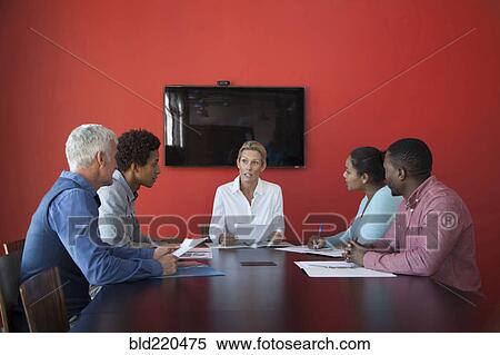 Business people talking in conference room meeting View Large Photo Image Stock Photography - Business people talking in conference room meeting. Fotosearch