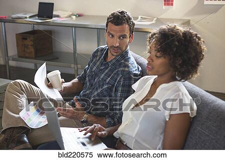 Business people working together in office View Large Photo Image Stock Photography - Business people working together in office. Fotosearch