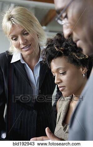 Business people working together View Large Photo Image Stock Image - Business people working together. Fotosearch