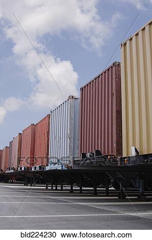 Stock Image - Cargo containers in parking lot. Fotosearch