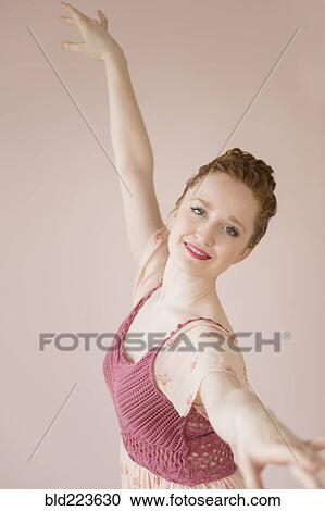 Stock Image - Caucasian ballerina dancing. Fotosearch