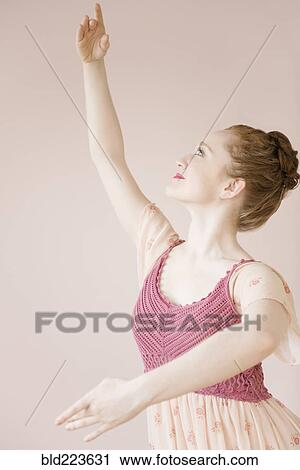 Caucasian ballerina dancing View Large Photo Image Stock Image - Caucasian ballerina dancing. Fotosearch