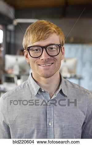 Picture - Caucasian businessman smiling. Fotosearch