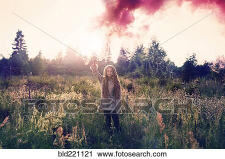 Caucasian teenage girl spraying pigment powder View Large Photo Image Stock Image - Caucasian teenage girl spraying pigment powder. Fotosearch