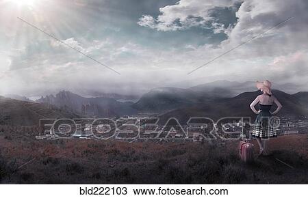 Stock Image - Caucasian woman admiring scenic view. Fotosearch