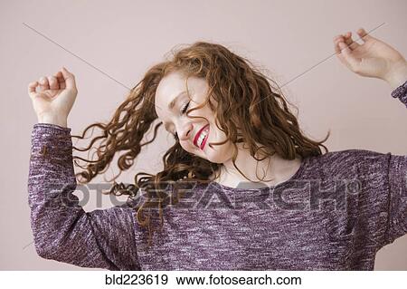 Caucasian woman dancing View Large Photo Image Stock Photo - Caucasian woman dancing. Fotosearch