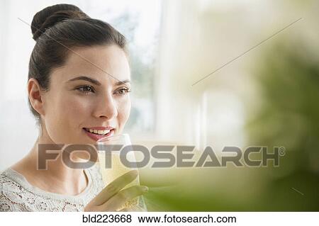 Caucasian woman drinking champagne View Large Photo Image Stock Photo - Caucasian woman drinking champagne. Fotosearch