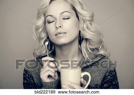 Caucasian woman drinking coffee View Large Photo Image Stock Photo - Caucasian woman drinking coffee. Fotosearch